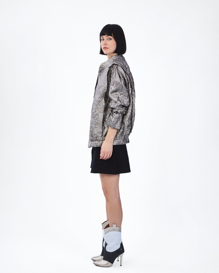 A metallic silver jacket