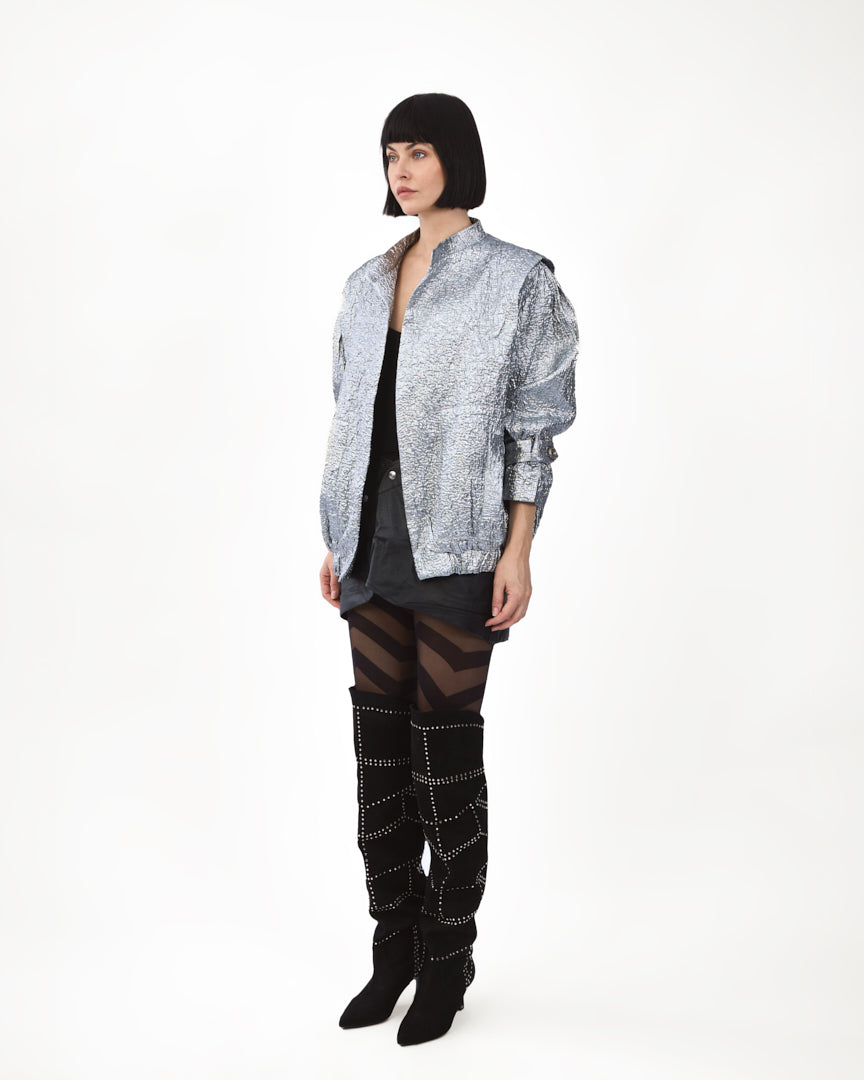 A bold metallic silver jacket