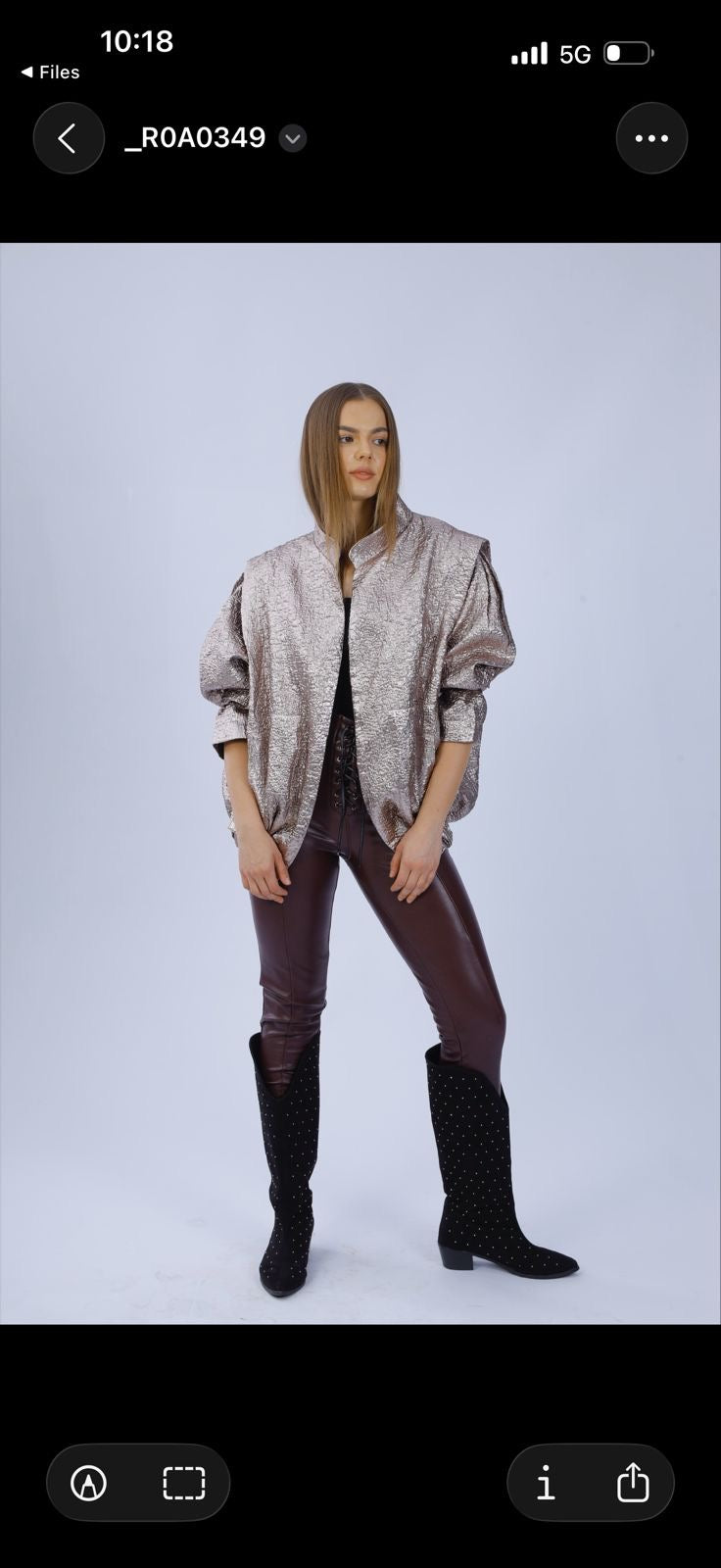 A metallic rose-gold jacket